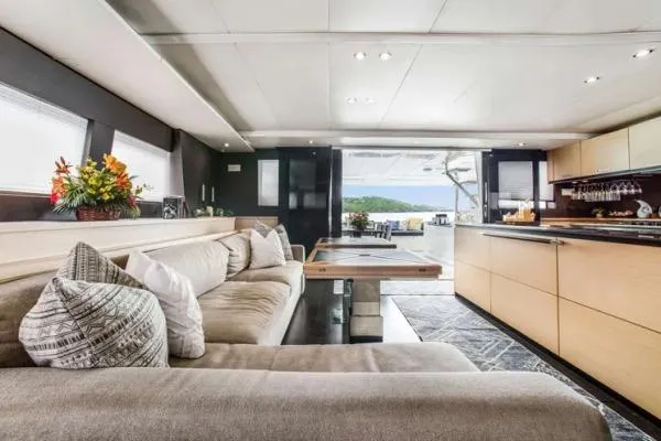 Lena Yacht Photos Pics Luxurious interior of 2017 Lagoon 63 Power yacht with modern furnishings and scenic view.