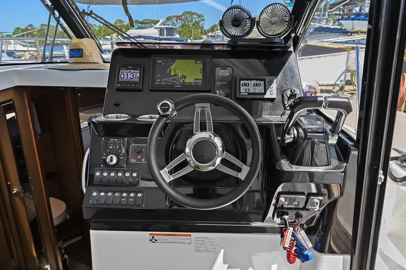 Trinity Yacht Photos Pics 2020 Jeanneau NC 1095 Fly helm with modern navigation and control systems.