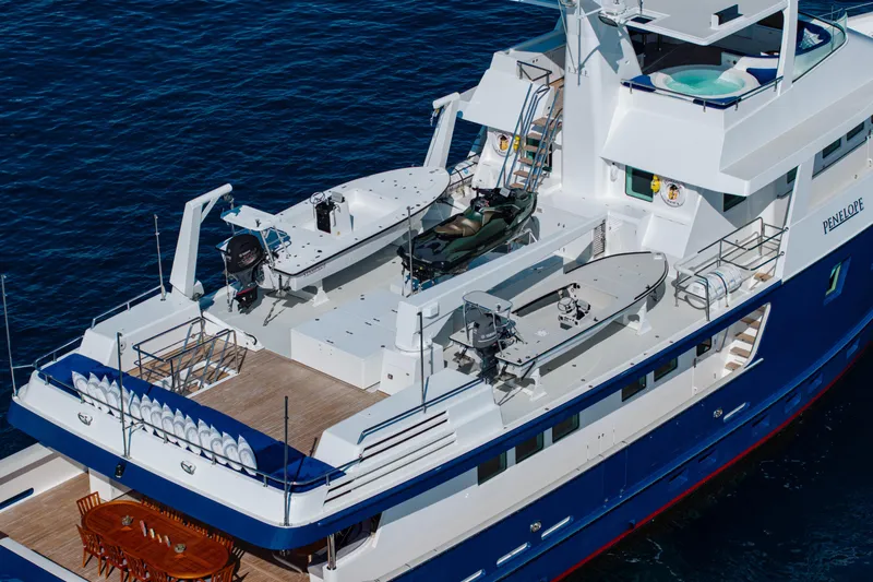 Penelope Yacht Photos Pics Aerial view of 1990 Delta Expedition yacht with deck and watercraft.