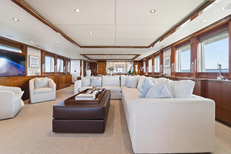 Penelope Yacht Photos Pics Luxurious interior of 1990 Delta Expedition yacht with elegant seating and panoramic windows.
