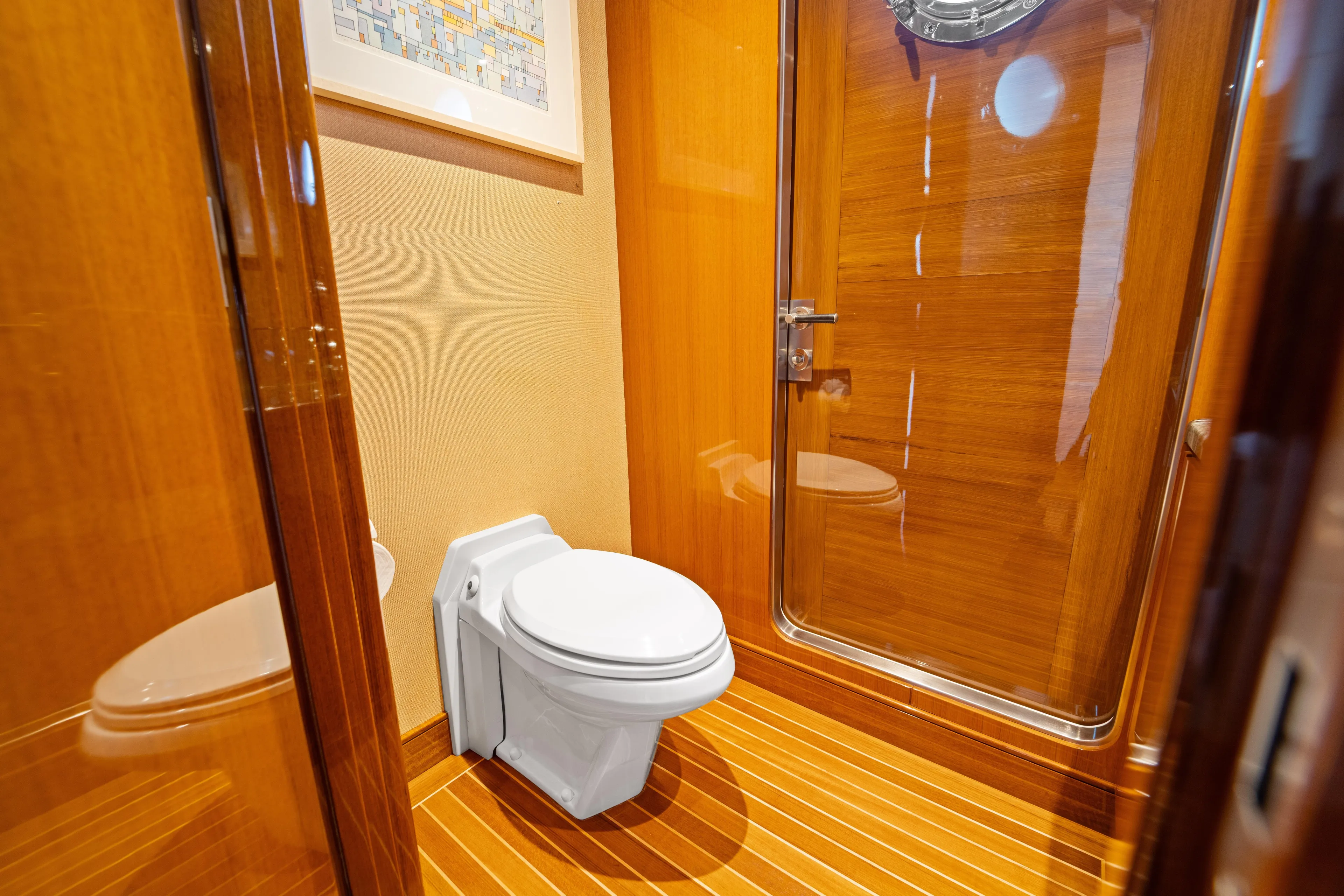Penelope Yacht Photos Pics Luxurious wooden bathroom interior on 1990 Delta Expedition yacht.