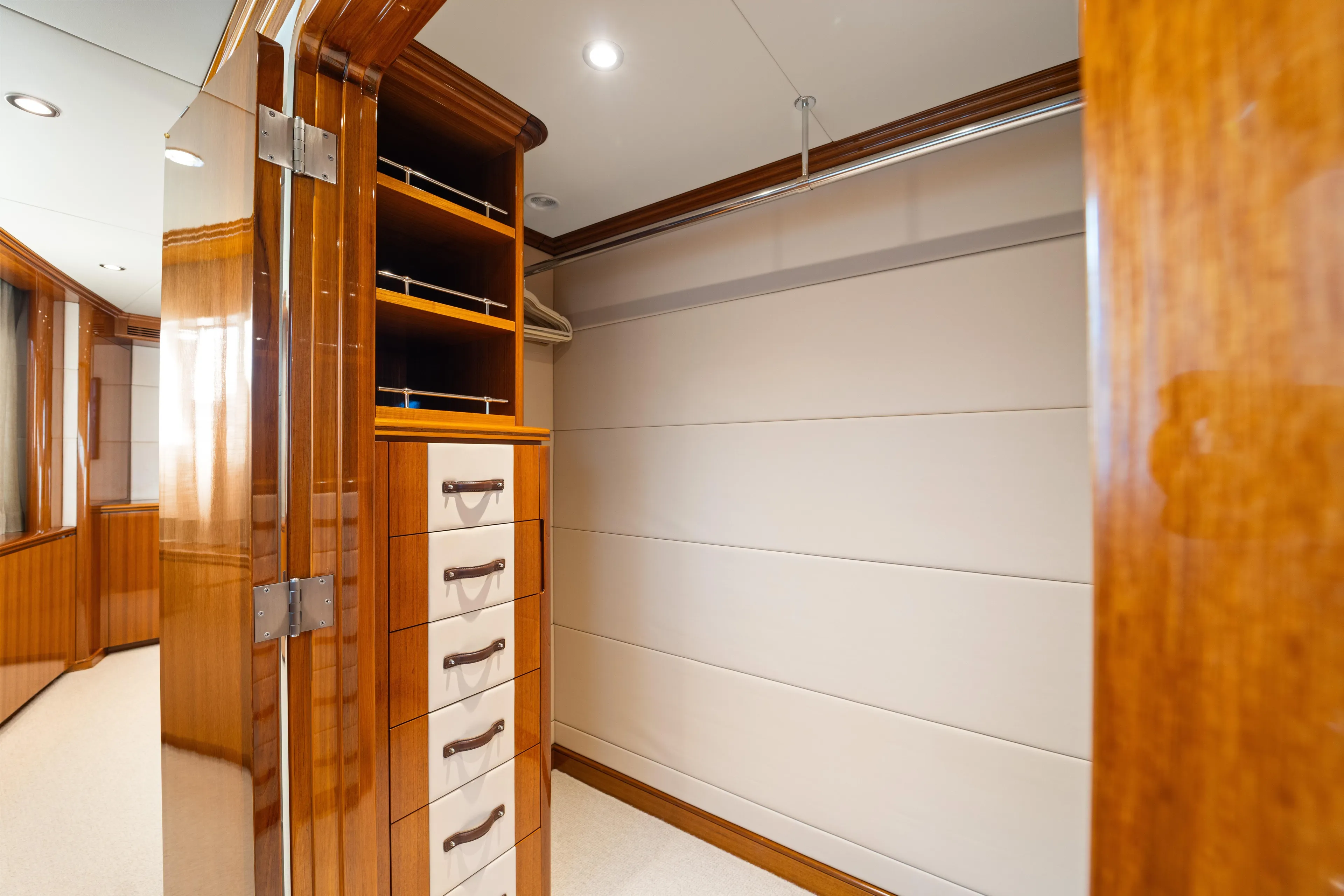 Penelope Yacht Photos Pics Luxurious wooden interior of 1990 Delta Expedition yacht with drawers and shelves.