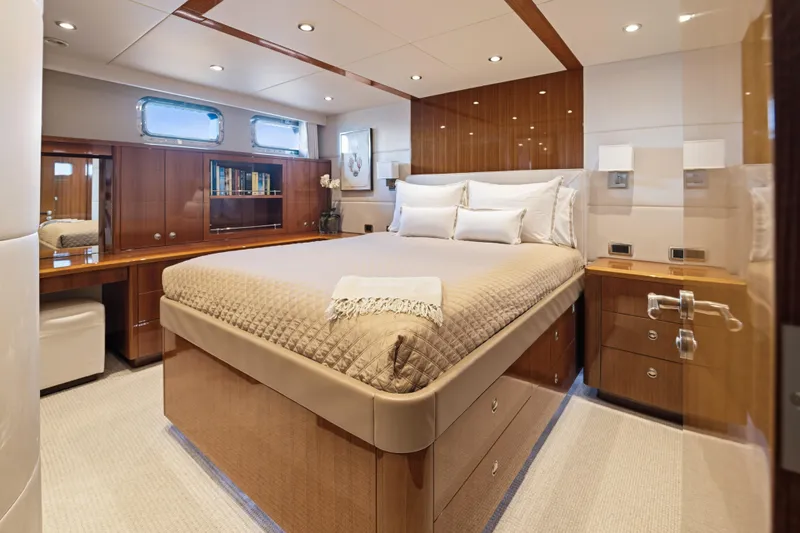 Penelope Yacht Photos Pics Luxurious cabin interior of 1990 Delta Expedition yacht with elegant wood finishes.