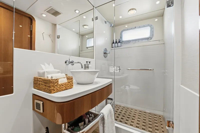 Penelope Yacht Photos Pics Luxurious 1990 Delta Expedition yacht bathroom with modern fixtures and elegant design.