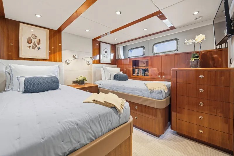 Penelope Yacht Photos Pics Luxurious 1990 Delta Expedition yacht cabin with twin beds and elegant wood finish.