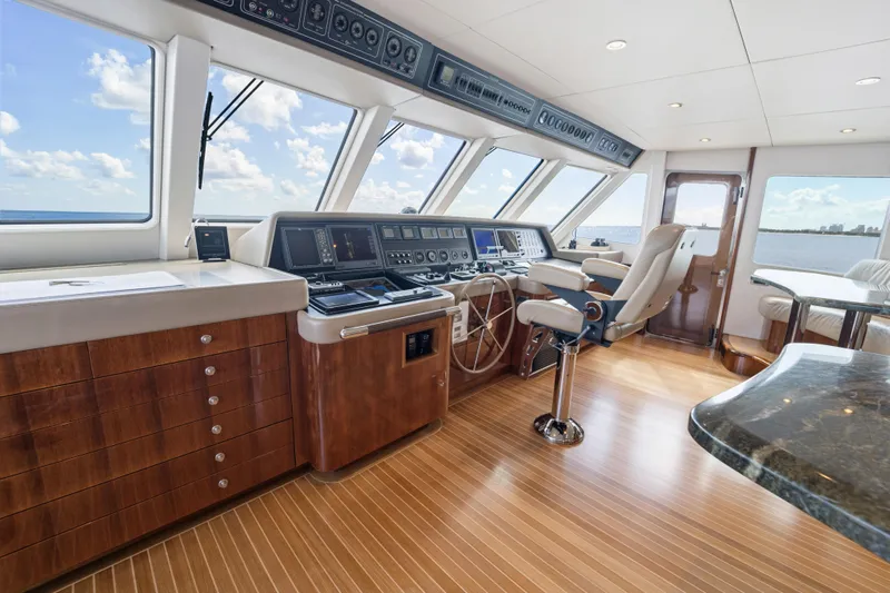 Penelope Yacht Photos Pics Luxurious 1990 Delta Expedition yacht helm with modern controls and panoramic ocean views.