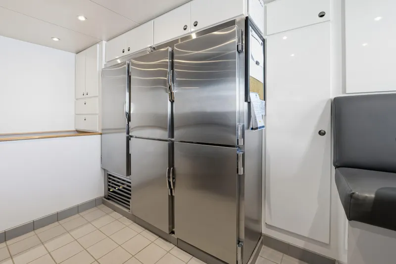 Penelope Yacht Photos Pics Stainless steel refrigerator in modern kitchen, Delta Expedition 1990 model.