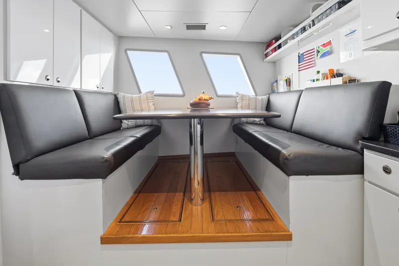 Penelope Yacht Photos Pics Luxurious 1990 Delta Expedition yacht interior with sleek seating and modern decor.