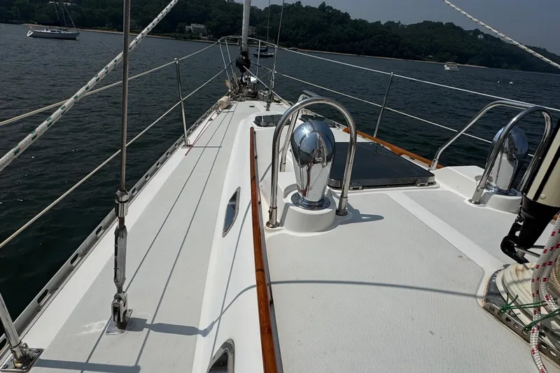 Elena Yacht Photos Pics Sailing deck of a 1998 Hylas 46 yacht on calm waters.