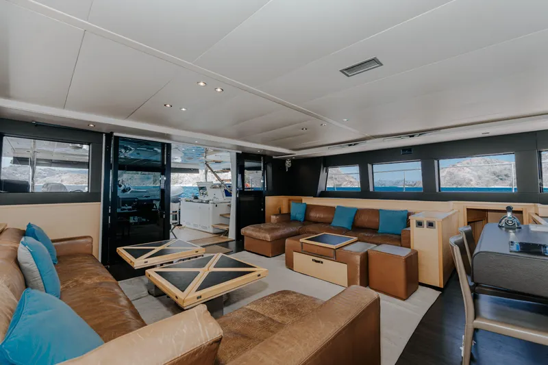  Yacht Photos Pics Luxurious interior of 2017 Lagoon 630 Motor Yacht with leather seating and modern decor.