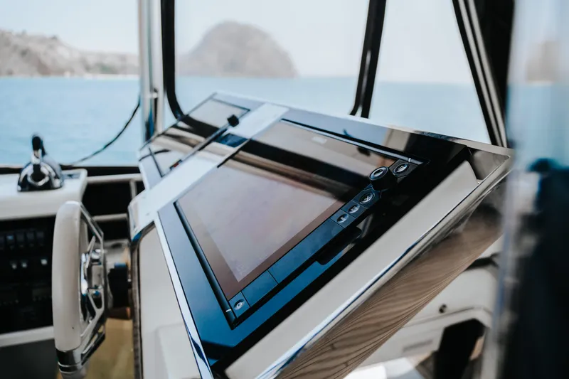  Yacht Photos Pics Control panel of 2017 Lagoon 630 Motor Yacht with ocean view.