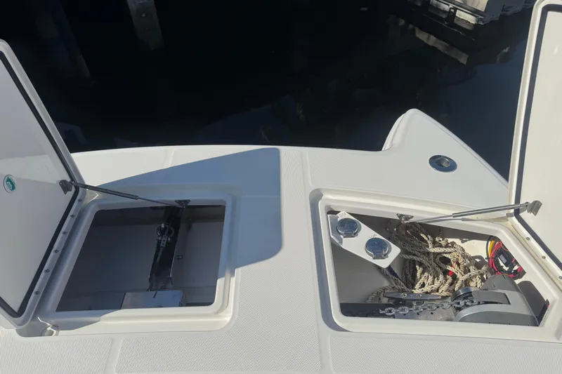  Yacht Photos Pics Open storage compartments on 2021 World Cat 400 DC-X boat deck.
