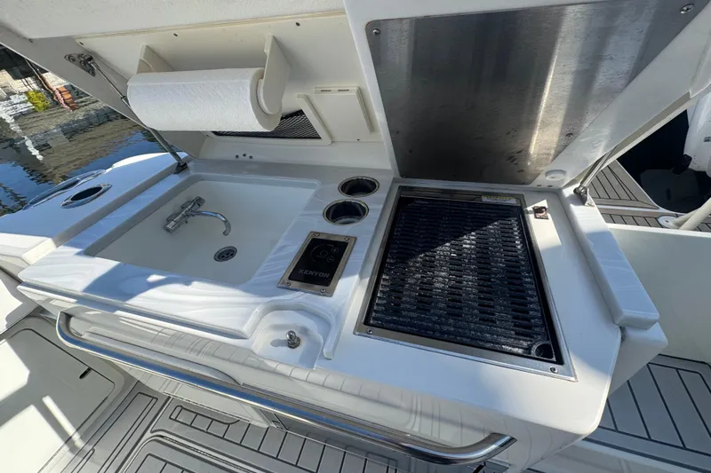  Yacht Photos Pics Outdoor kitchen on 2021 World Cat 400 DC-X boat with sink and grill.
