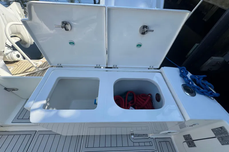  Yacht Photos Pics Open storage compartments on a 2021 World Cat 400 DC-X boat deck.
