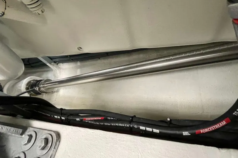  Yacht Photos Pics Engine room of 2022 Sirena 58 yacht, featuring stainless steel shaft and cables.