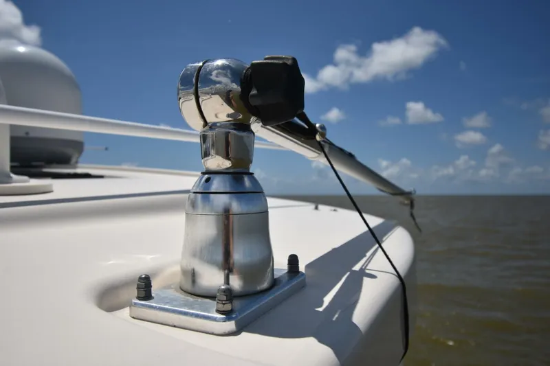 Policy Maker Yacht Photos Pics Close-up of a 2016 Grady-White Express 330 boat detail against a clear sky.