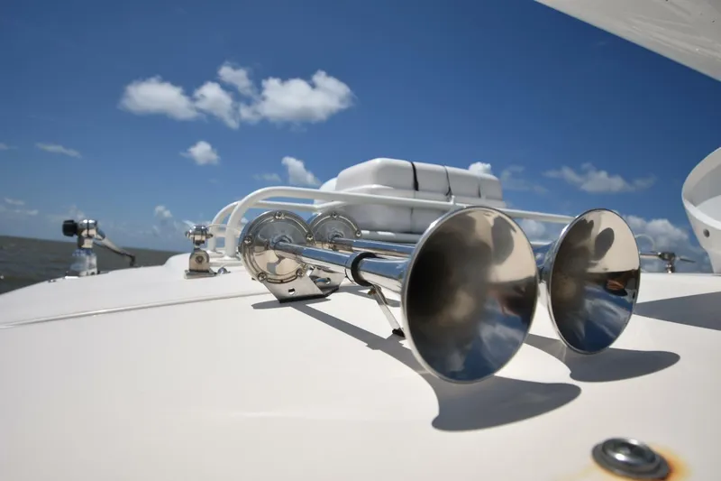 Policy Maker Yacht Photos Pics 2016 Grady-White Express 330 boat horn under clear blue sky.