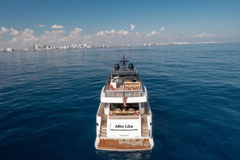 Sanlorenzo Sl86 Yacht Photos Pics 2022 Sanlorenzo SL86 yacht on open sea with city skyline in background.