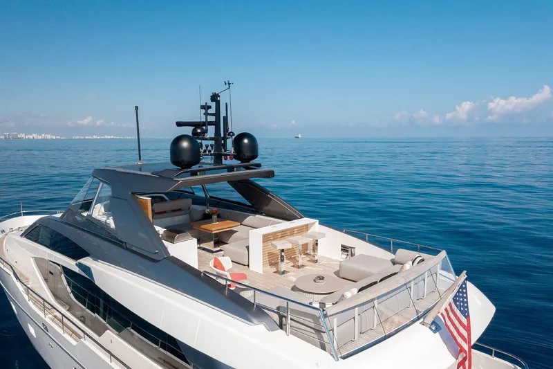 Sanlorenzo Sl86 Yacht Photos Pics Sanlorenzo SL86 2022 yacht cruising on calm ocean waters under clear blue skies.