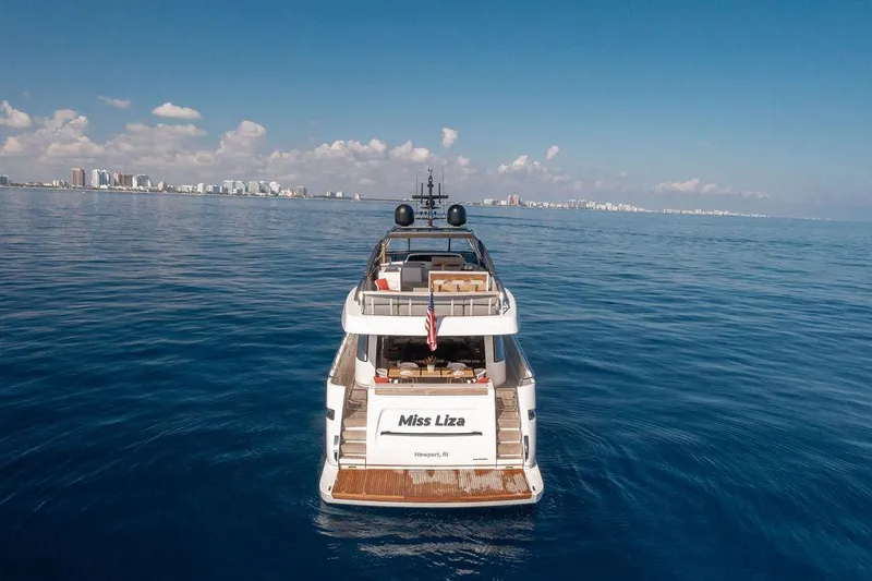 Sanlorenzo Sl86 Yacht Photos Pics Sanlorenzo SL86 yacht cruising on open sea, 2022 model, with city skyline in background.