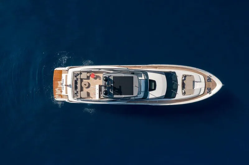 Sanlorenzo Sl86 Yacht Photos Pics Aerial view of 2022 Sanlorenzo SL86 yacht cruising on deep blue water.