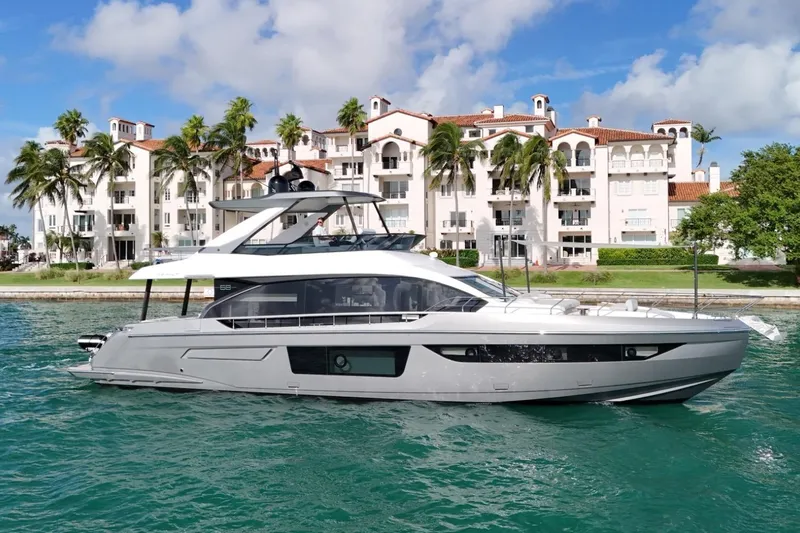  Yacht Photos Pics Luxury Azimut Fly 68 yacht cruising near waterfront villas, 2023 model.