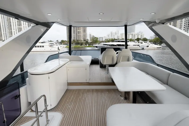  Yacht Photos Pics Luxurious 2023 Azimut Fly 68 yacht interior with elegant seating and modern amenities.