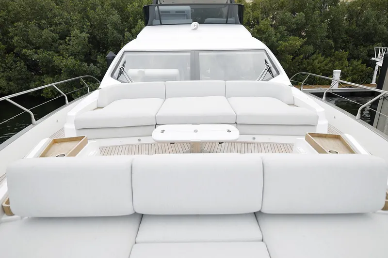  Yacht Photos Pics Luxurious 2023 Azimut Fly 68 yacht with spacious white seating area.