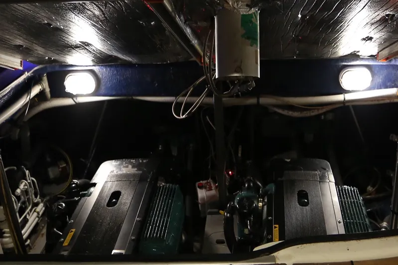  Yacht Photos Pics Engine room of 2008 Cranchi Mediterranee 43 yacht, featuring dual engines and illuminated interior.