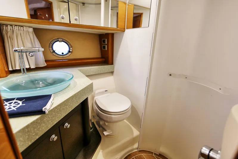  Yacht Photos Pics Bathroom interior of 2008 Cranchi Mediterranee 43 yacht with modern fixtures.