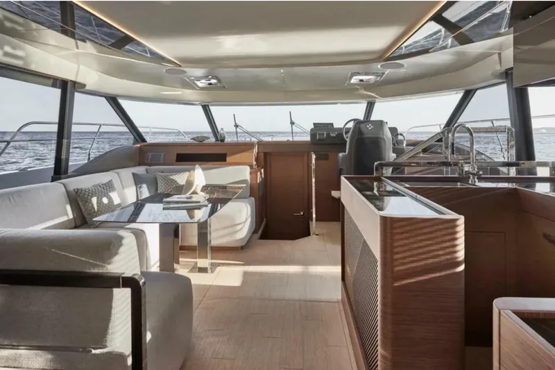  Yacht Photos Pics Luxurious interior of 2023 Prestige M48 yacht with modern seating and panoramic windows.