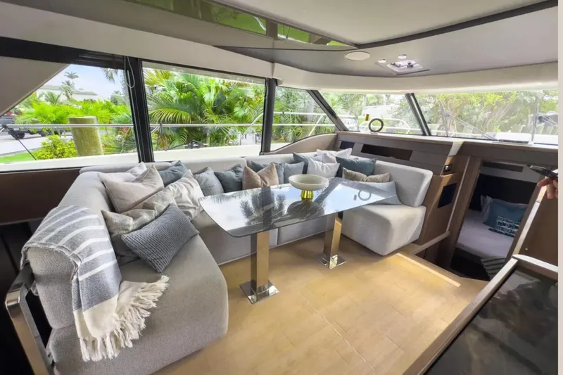  Yacht Photos Pics Luxurious interior of 2023 Prestige M48 yacht with plush seating and modern decor.