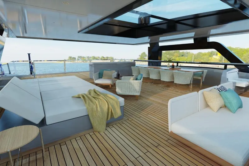 Yacht Photos Pics Luxurious 2027 Silver Yachts SC24M deck with elegant seating and scenic ocean view.