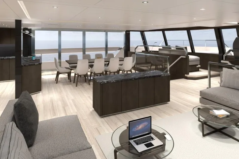  Yacht Photos Pics Luxurious interior of 2027 Silver Yachts SC24M, featuring modern dining and lounge areas with ocean views.