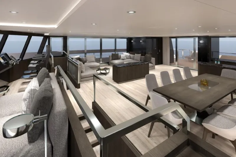  Yacht Photos Pics Luxurious interior of 2027 Silver Yachts SC24M, featuring modern seating and dining areas with ocean views.