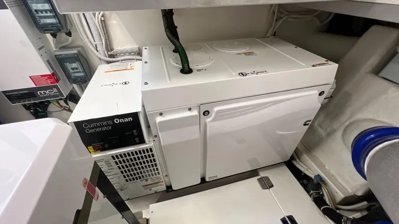 Trigal Yacht Photos Pics Cummins Onan generator in 2021 Maritimo X60 yacht engine room.