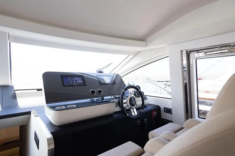  Yacht Photos Pics Luxurious interior of 2025 Azimut Fly 68 yacht, featuring modern helm and sleek design.