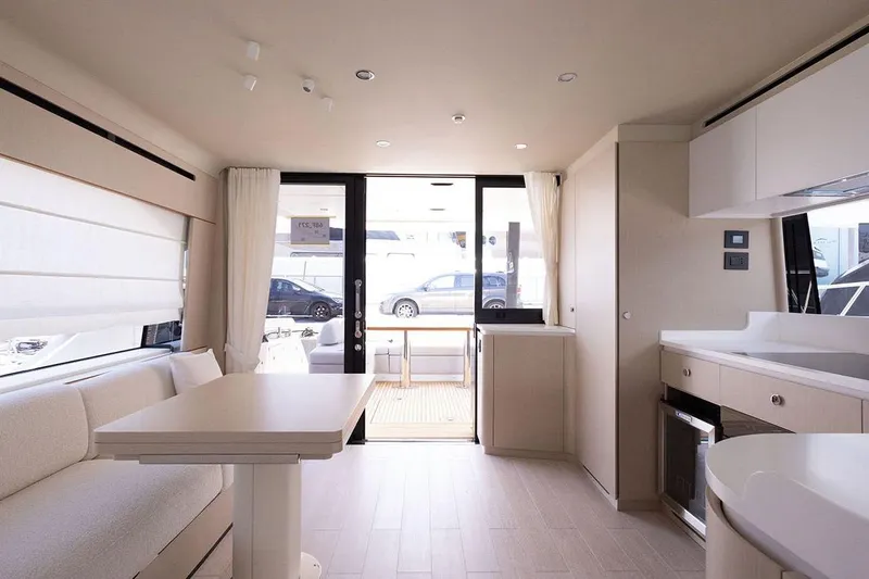  Yacht Photos Pics Luxurious interior of 2025 Azimut Fly 68 yacht with modern furnishings and natural light.