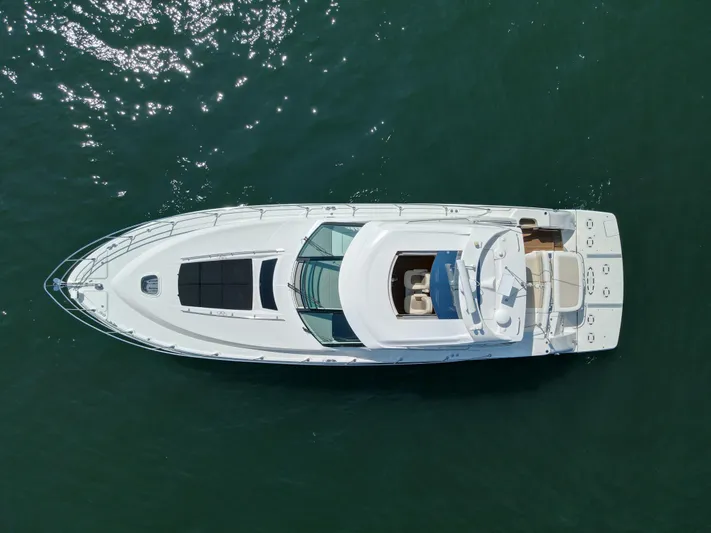 Why Knot Yacht Photos Pics Overhead view of 2012 Sea Ray 540 Sundancer yacht on water.