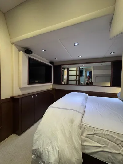 Why Knot Yacht Photos Pics Luxurious bedroom interior of 2012 Sea Ray 540 Sundancer yacht with modern amenities.