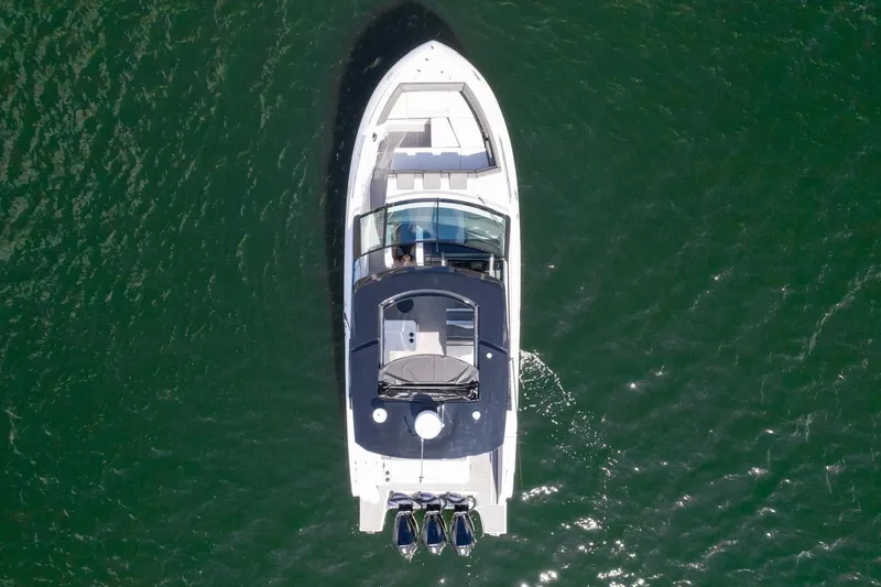  Yacht Photos Pics Aerial view of 2022 New Cruiser Yachts GLS 38 on open water.