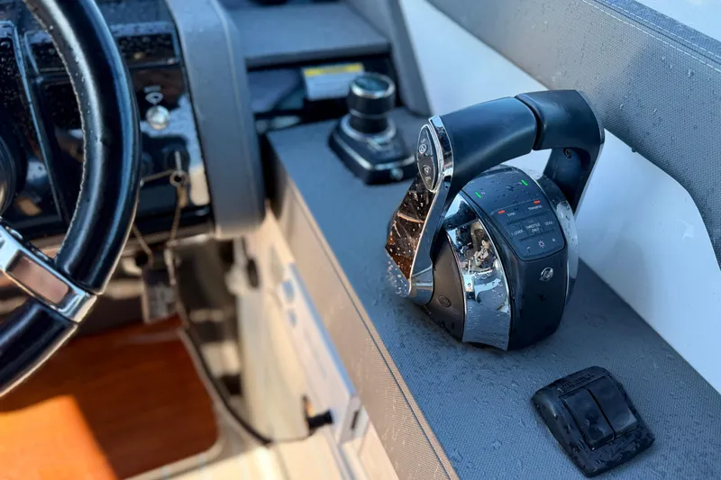  Yacht Photos Pics Close-up of 2022 New Cruiser Yachts GLS 38 helm controls and steering wheel.