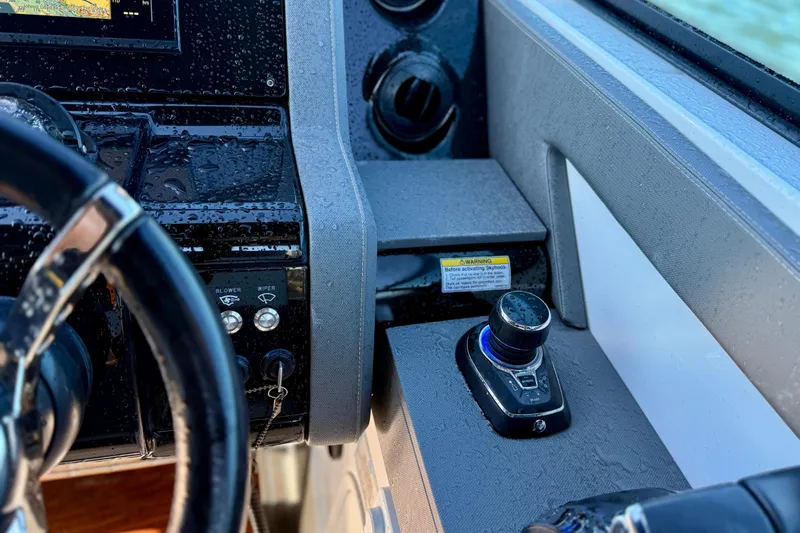  Yacht Photos Pics 2022 New Cruiser Yachts GLS 38 helm with joystick control and wet dashboard.