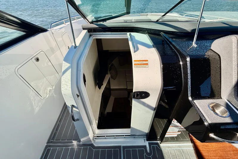  Yacht Photos Pics 2022 New Cruiser Yachts GLS 38 cabin entrance with sleek design and modern features.