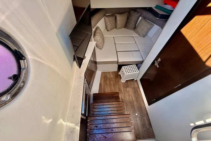  Yacht Photos Pics Interior of 2022 New Cruiser Yachts GLS 38, featuring cozy seating and modern amenities.