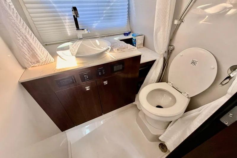  Yacht Photos Pics 2022 New Cruiser Yachts GLS 38 bathroom with modern sink and toilet.