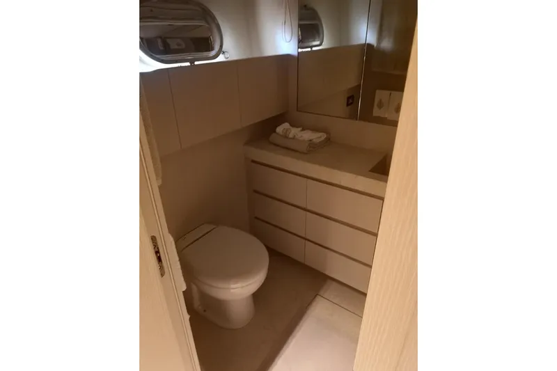  Yacht Photos Pics Bathroom interior of 2011 Sanlorenzo 72 yacht, featuring modern fixtures and cabinetry.