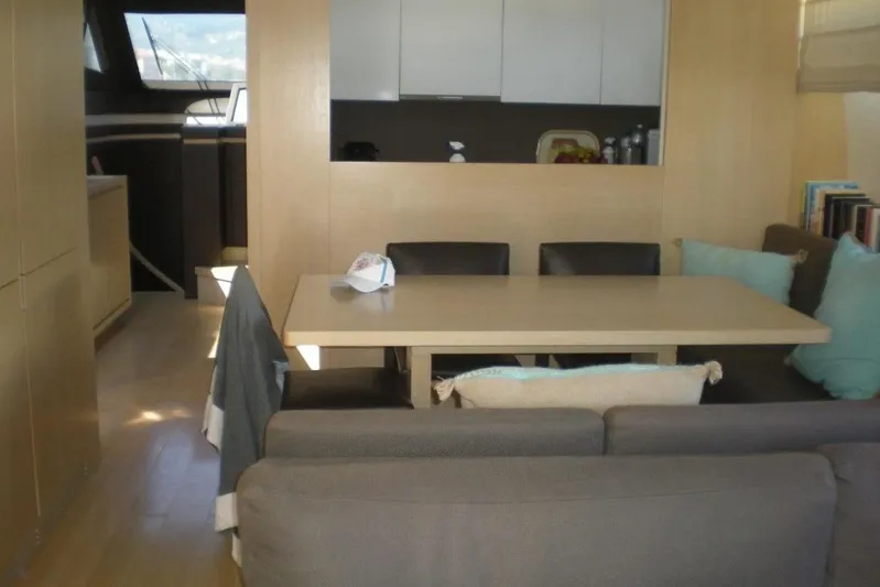  Yacht Photos Pics Interior of 2011 Sanlorenzo 72 yacht with dining area and modern furnishings.