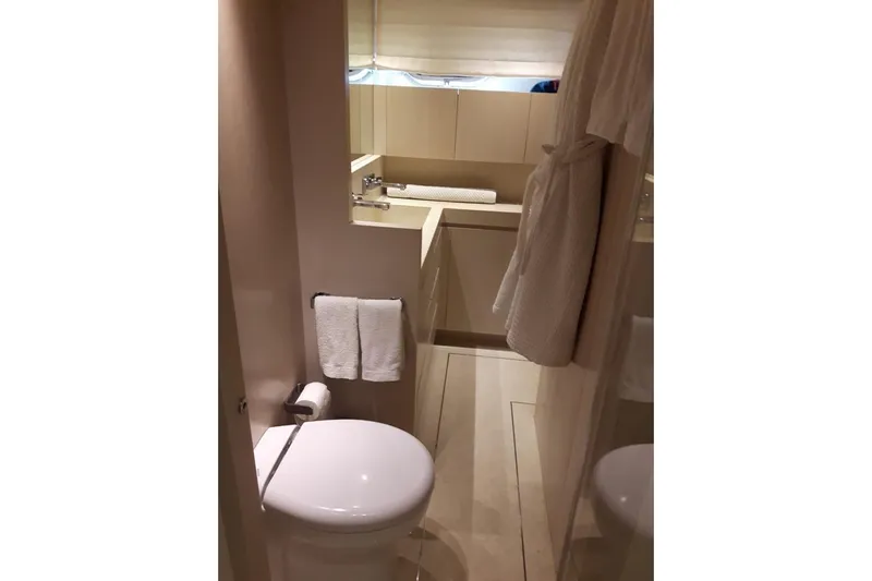  Yacht Photos Pics Luxurious bathroom in 2011 Sanlorenzo 72 yacht, featuring modern fixtures and elegant design.