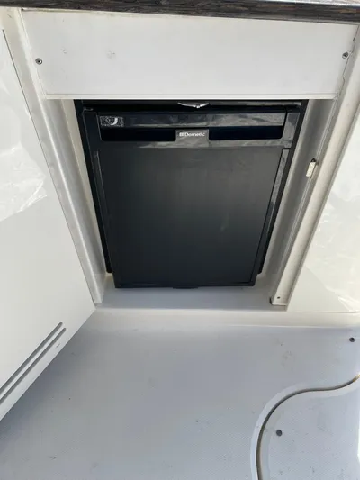  Yacht Photos Pics Built-in refrigerator on a 2014 Sea Ray 370 Sundancer yacht.